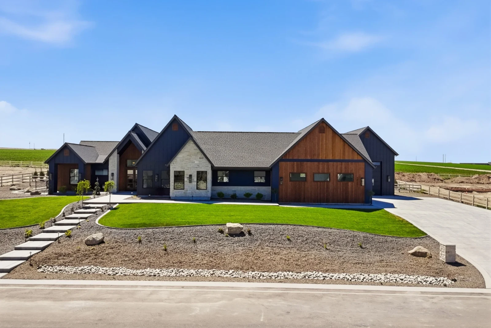 The Cody: dark gables, stone and timber exterior